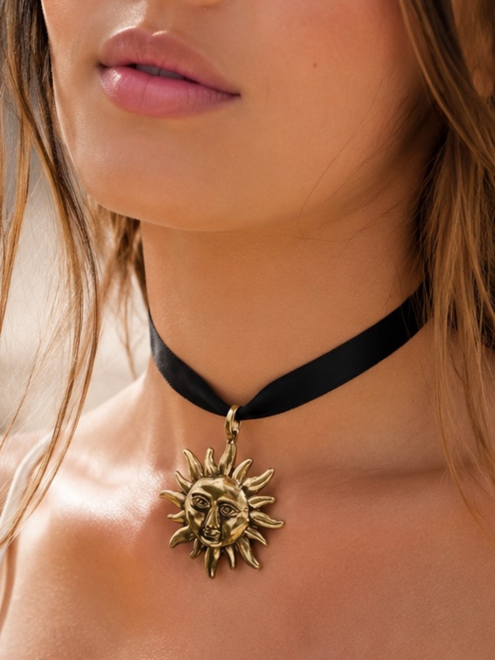 Gold Sunburst Pendant on Black Ribbon Choker